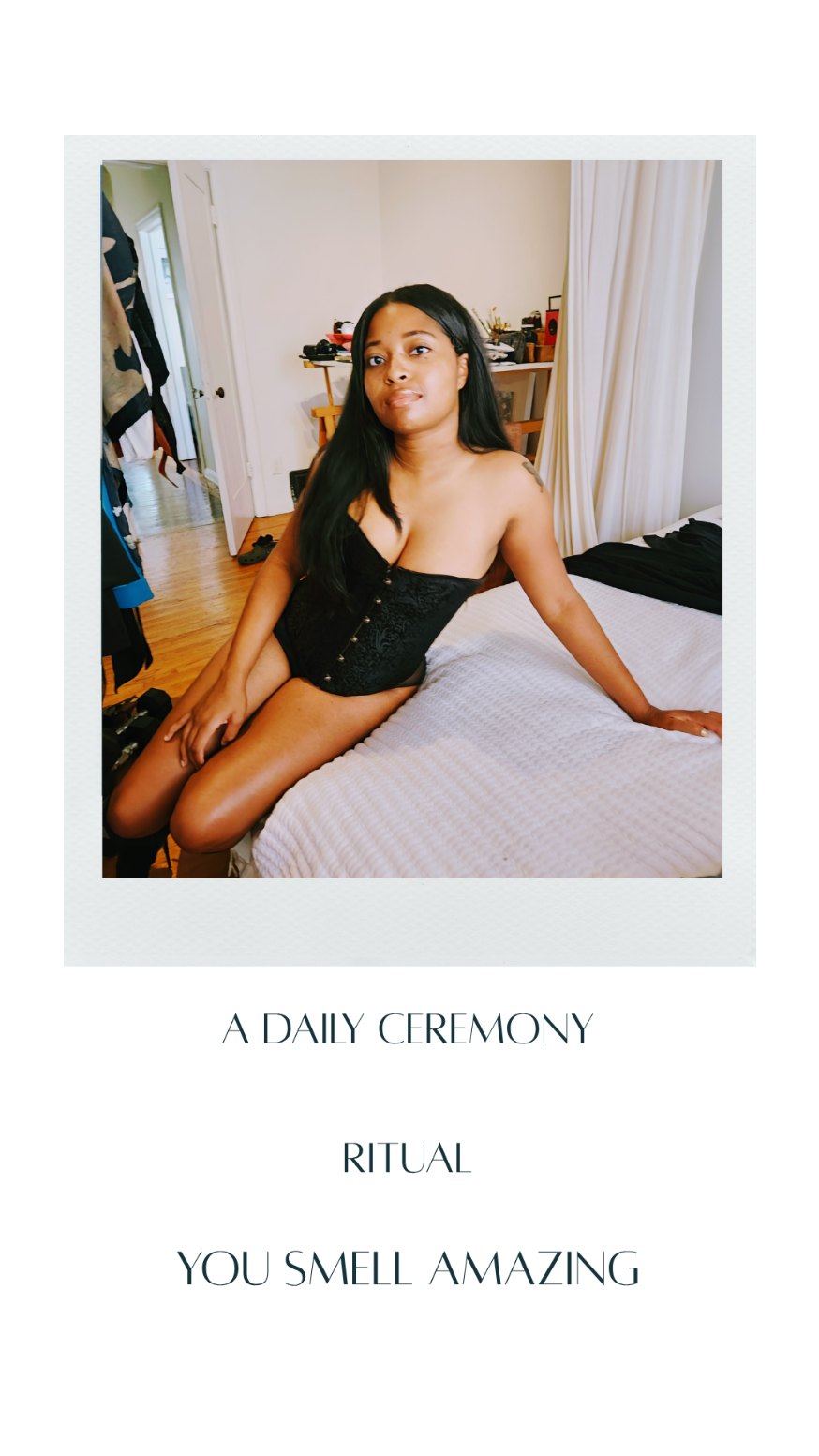 A square product card featuring a Polaroid-style photo of a woman in a black bodysuit sitting on a bed, with the text 'A DAILY CEREMONY RITUAL YOU SMELL AMAZING' printed below on a white background.